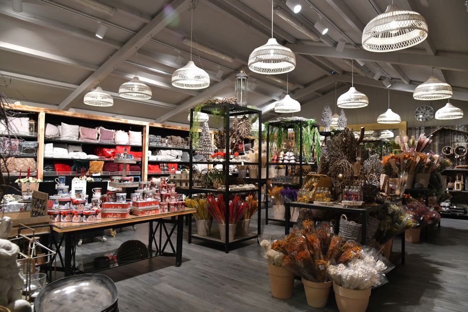 Interior of a boutique gift shop stocked with home goods, gifts, and decor.